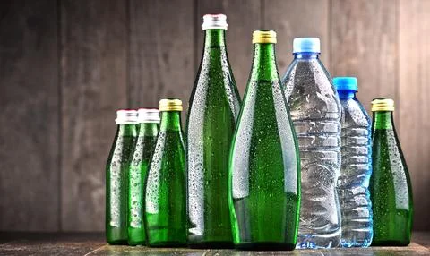 Composition with different sorts of bottles containing mineral water. Stock Photos