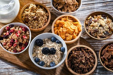 Composition with different sorts of breakfast cereal products Stock Photos