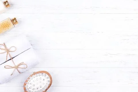 Composition of different spa, beauty and wellness products on white wooden .. Stock Photos
