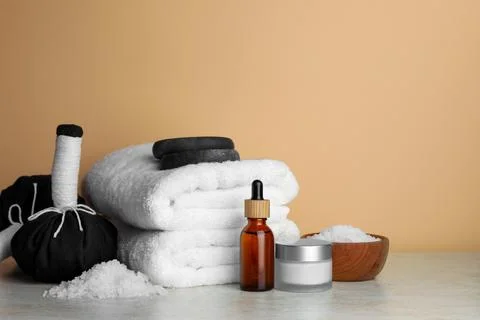 Composition with different spa products on beige table. Space for text Stock-Fotos