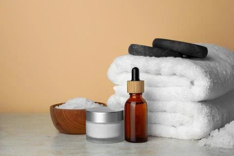 Composition with different spa products on beige table. Space for text Stock-Fotos