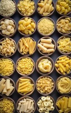 Composition with different tasty uncooked pasta - Italian pasta wallpaper, .. Stock Photos