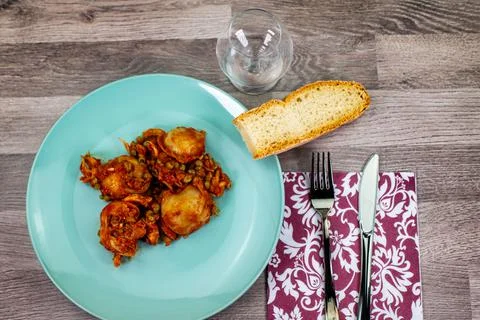 Composition of dish with cuttlefish and peas Stock Photos