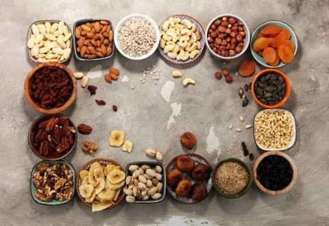Composition with dried fruits and assorted healthy nuts. Stock Photos