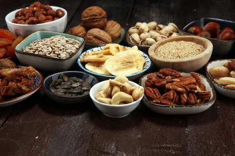 Composition with dried fruits and assorted healthy nuts. Stock Photos