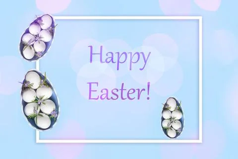 Composition with Easter eggs and green twigs rosemary on blue background Foto stock