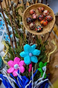 Composition with Easter eggs and green branches Stock Photos