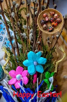 Composition with Easter eggs and green branches Stock Photos