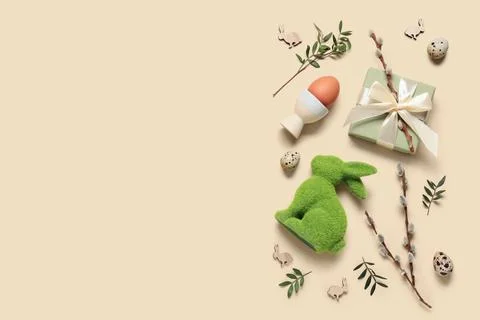 Composition with Easter eggs, decorative bunny, gift box and pussy willow bra Stock Photos
