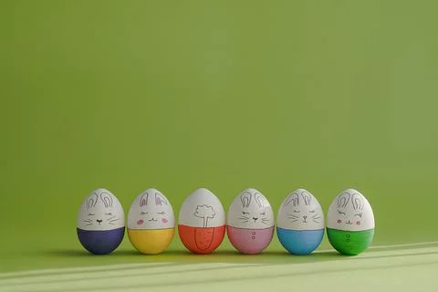 Composition with easter eggs on green background. Stock Photos