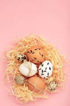 Composition with Easter eggs on pink background Foto stock
