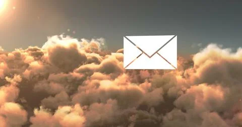 Composition of email envelope icon over clouds Foto stock