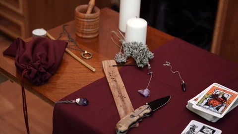 Composition of esoteric objects for healing, meditation and purifying on table. Stock Footage 108009913