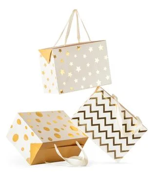Composition of falling gift paper boxes isolated on white background. Stock Photos