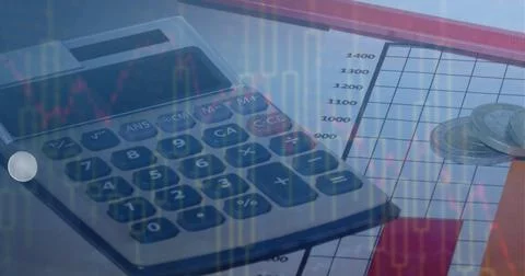 Composition of financial data processing over calculator on office desk Foto stock