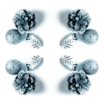 Composition flat lay Christmas decor silver cones nuts balls isolated on whit Stock Photos