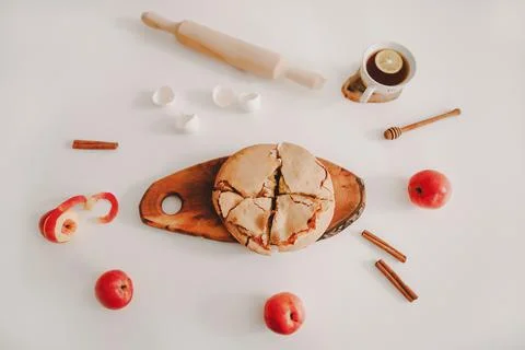 Composition with a fresh baked apple pie with ingredients Stock Photos