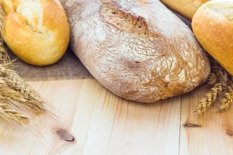 Composition fresh bread crispy rolls Stock Photos