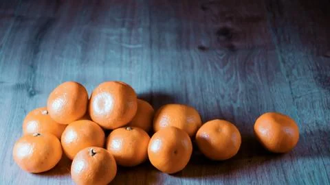 A composition of fresh mandarins on the table Stock Photos