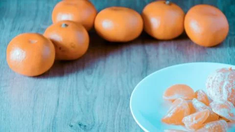 A composition of fresh mandarins on the table Foto stock
