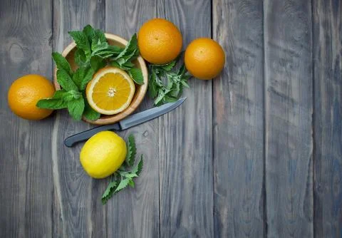 Composition with fresh orange , mint, lemons  closeup. Fresh natural drink .. Foto stock