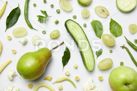 Composition with fresh vegetables and fruits on a white background Stock Photos