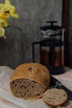 Composition of freshly baked bread on old wooden background Stock Photos