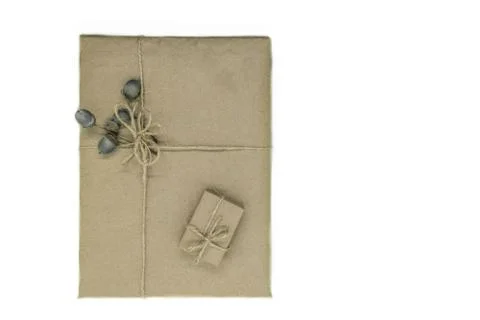 Composition of gift boxes wrapped in beige paper Stock Photos