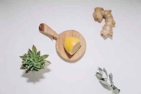 Composition of ginger and lemon on white background, hard light Stock Photos