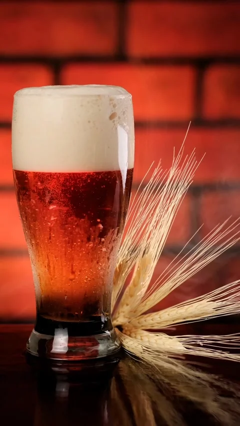 Composition of a glass with cold beer Stock Footage 257869724