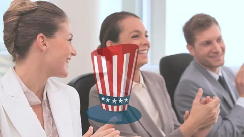 Composition of globe arrow over diverse colleagues stacking hands at casual Stock Footage 329780990