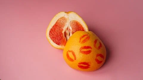 Composition with grapefruit on pink background Stock Photos
