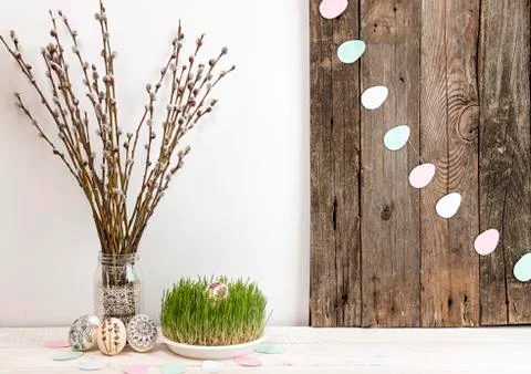Composition for greeting card: Easter eggs, willow branch, grass Stock Photos
