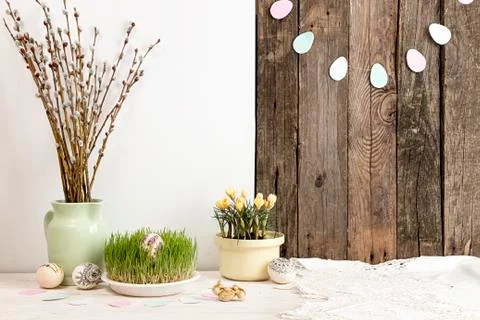 Composition for greeting card: Easter eggs, willow branch, grass, crocus Foto stock