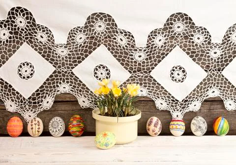 Composition for greeting card: Easter eggs, yellow crocus, rabbits Stock Photos