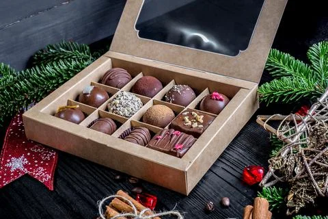Composition handmade chocolates in the style of Raffaello Foto stock