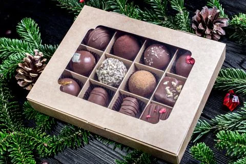 Composition handmade chocolates in the style of Raffaello Foto stock