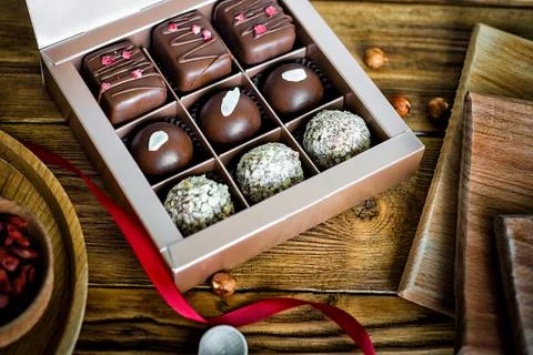 Composition handmade chocolates in the style of Raffaello Stock Photos