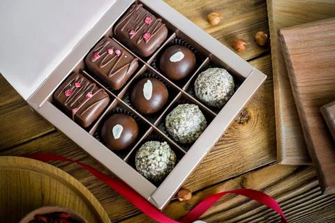 Composition handmade chocolates in the style of Raffaello Stock Photos