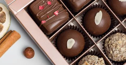 Composition handmade chocolates in the style of Raffaello Stock Photos