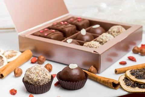 Composition handmade chocolates in the style of Raffaello Foto stock