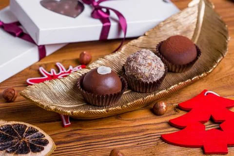 Composition handmade chocolates in the style of Raffaello Stock Photos