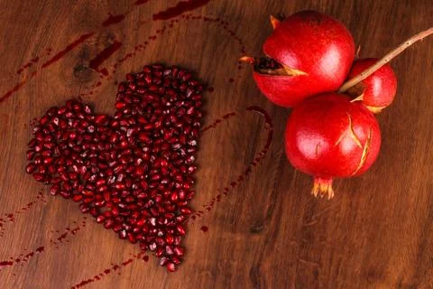 The composition heart pomegranate Stock-Fotos