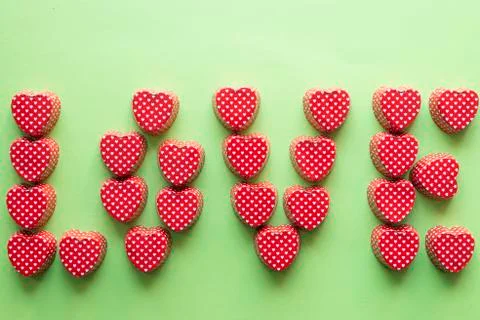 Composition with heart shape valentine cupcake metallic container Stock Photos
