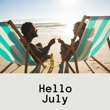Composition of hello july text over african american couple with drinks on beach Fotos Stock