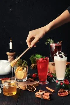 Composition with herbal and fruit tea with ingredients on the table Stock Photos