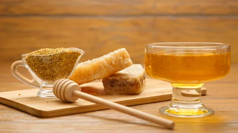 Composition of honey, honeycomb and bee bread (LR Pan) Stock Footage 66434273