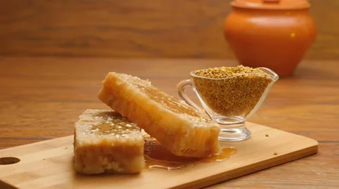 Composition of honey, honeycomb, bee bread and green apples (LR Pan, No 8.2) Stock Footage 67190529