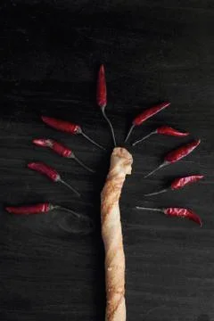 Composition of hot pepper and bread in the form of wood Foto stock