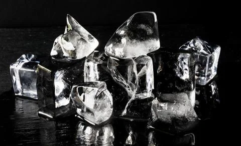 Composition of ice cubes against a black background. Foto stock